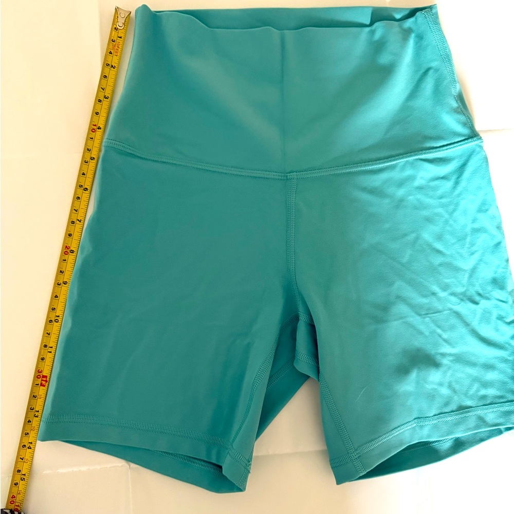 Lululemon Women’s Nulu Align size 4. Bright blue color. 6” NWOT